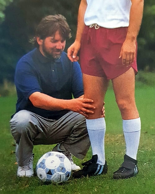 Alexander Technique Teacher Working on Footballer's Knee